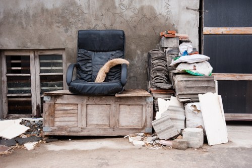 Inspector taking notes during a site inspection of waste storage