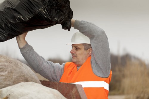 Recycling bins and sorted waste materials